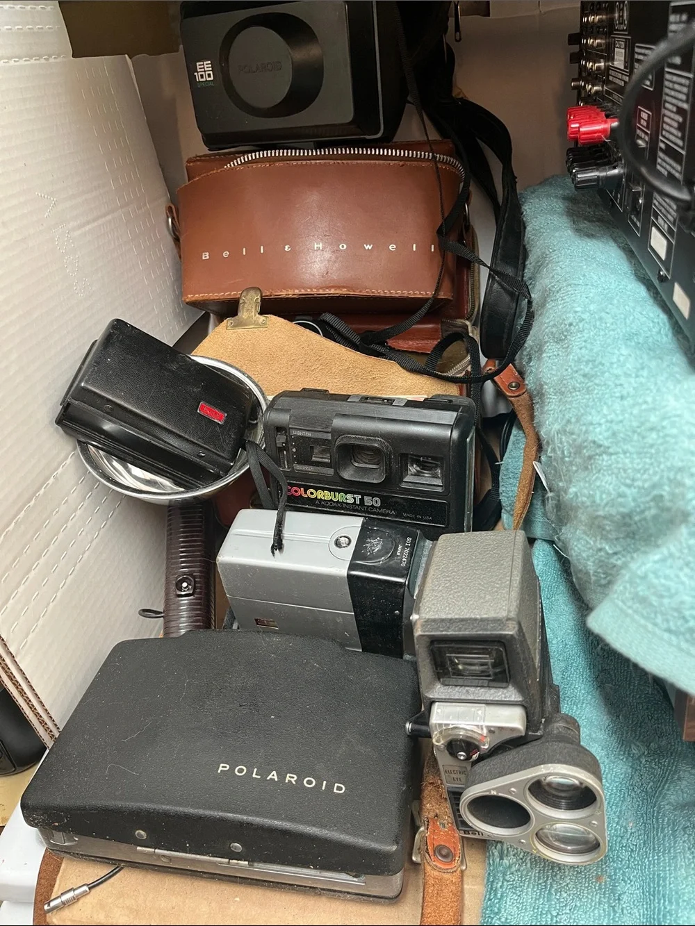 Polaroid Assorted Vintage Cameras and Accessories in Black and Brown others